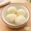 Four rasgullas in syrup in a white bowl with Halal Grocery logo